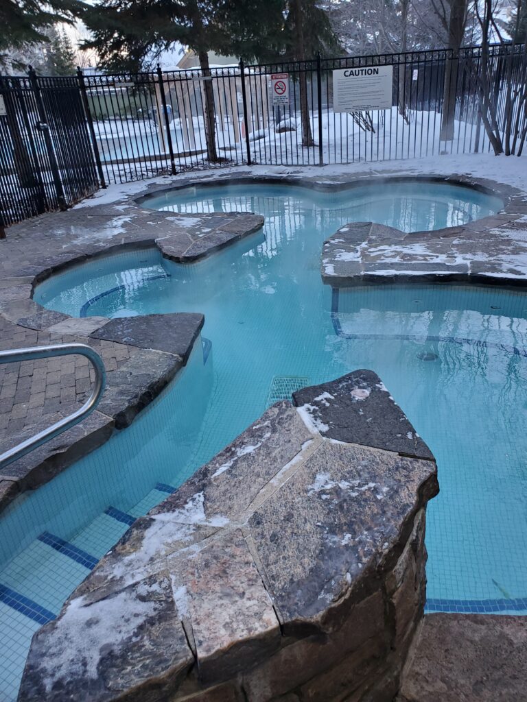 Enjoying the winter wonderland in the hot tub at the Mosaic in Blue Mountain Village