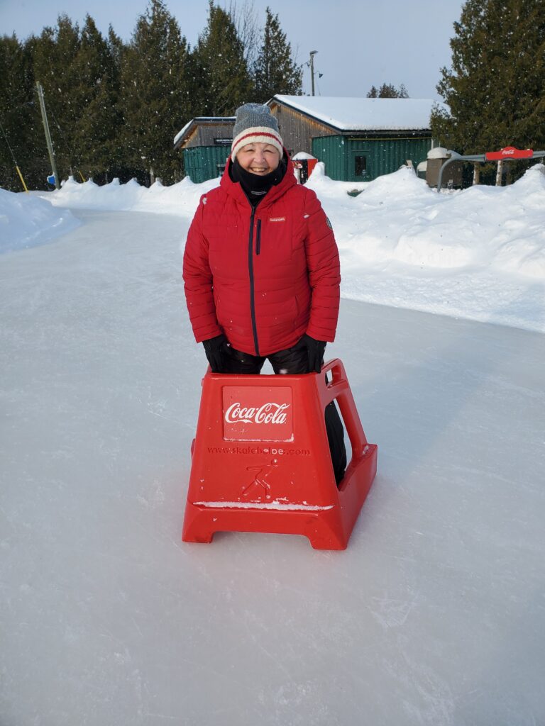 Skating and enjoying winter fun in Blue Mountain, Ontario on a winter vacation with the family