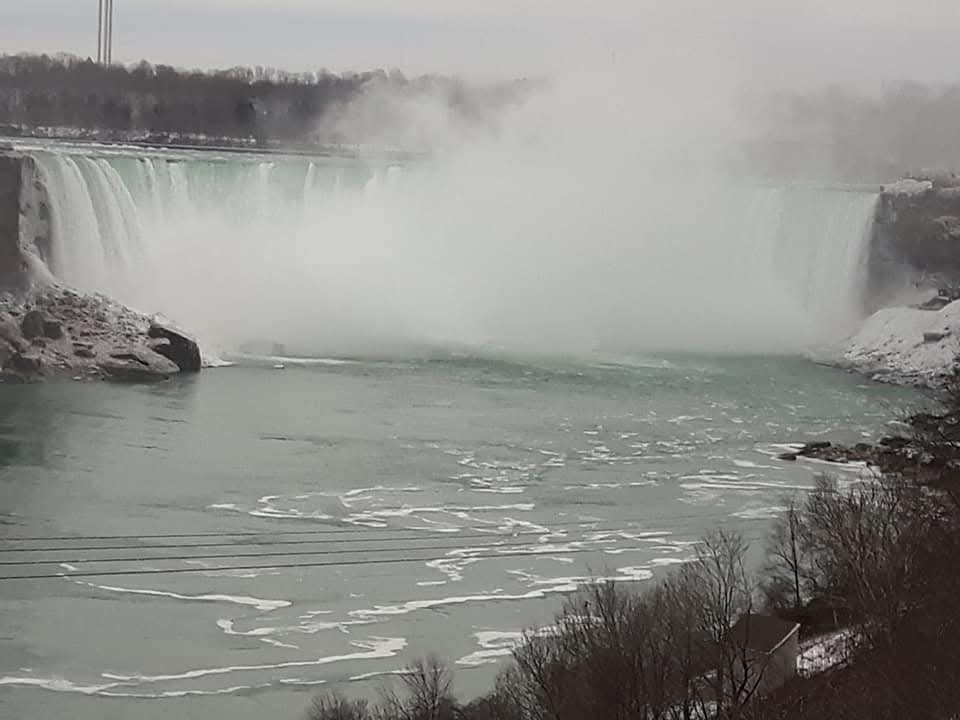The thunderous roar of the ice-covered Canadian Falls