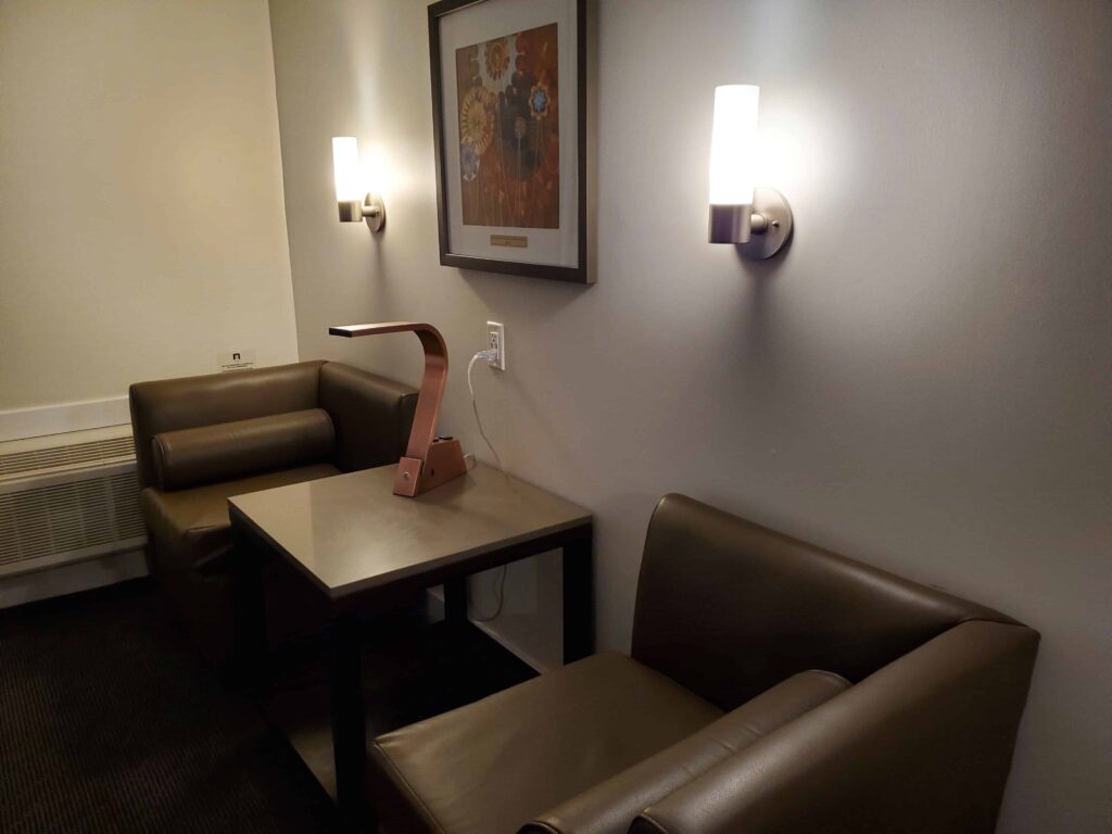 Sitting area in the Premium 2 Queen Room at Living Stone Golf Resort