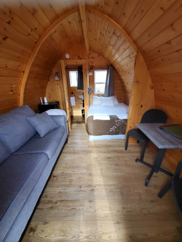 looking into the yurts at Eco Adventures which has a bathroom, bed and pull-out couch