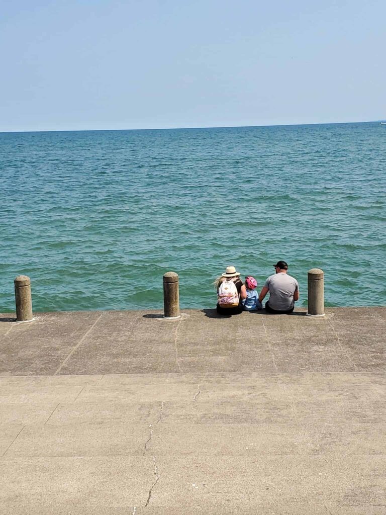 relaxing by the beach with family at Spencer Park in Burlington on a beautiful summer day