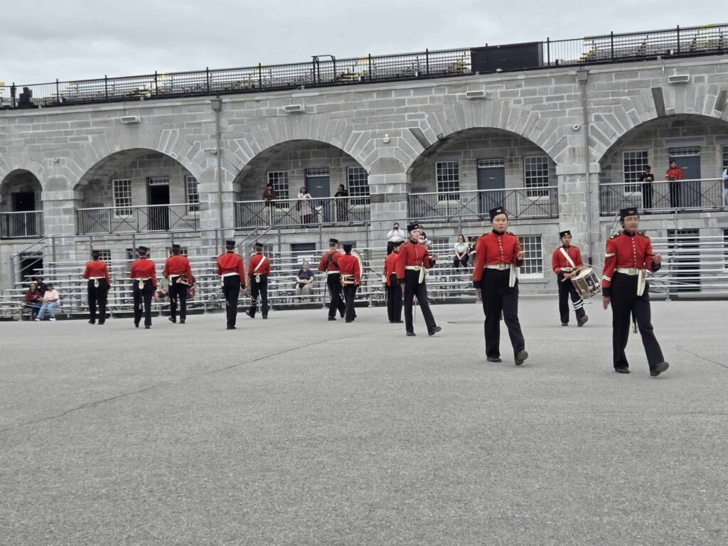 Band is dressed in the 19th century British military uniform at Fort Henry