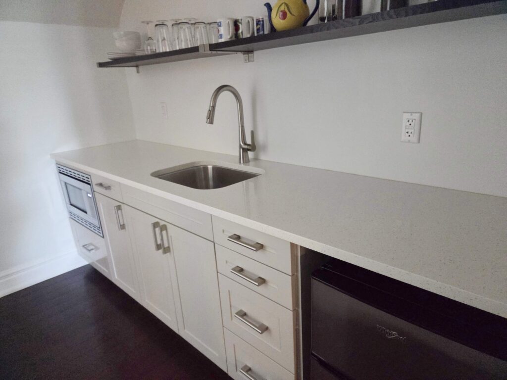I was able to use the fully stocked kitchen during my stay at the Newsroom Suites located on the main street of Wellington