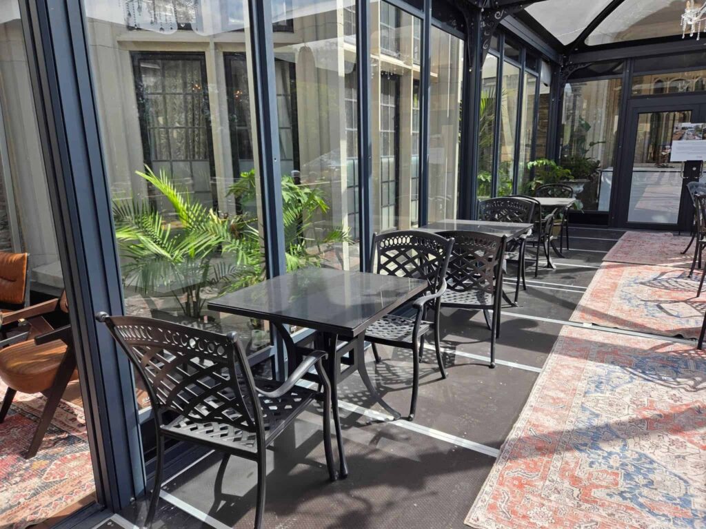 seasonal outdoor dining area which looks over the beautiful gardens