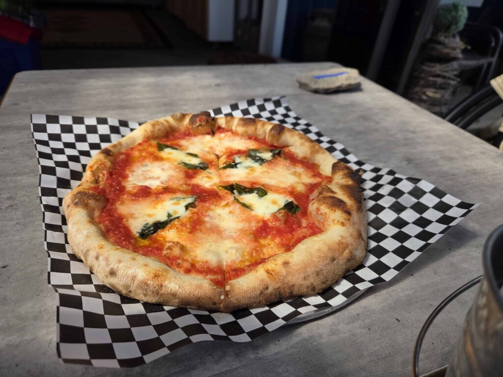 When wine tasting at Broken Stone Winery, I recommend trying their pizza
